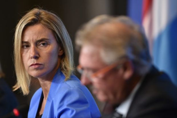 Federica Mogherini, the EU foreign policy chief, and Luxembourg Foreign Minister Jean Asselborn during a press conference. EU's foreign policy statements became infamous for their lack of any clear political message. JOHN THYS/AFP/Getty Images